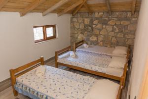Postel nebo postele na pokoji v ubytování Leonida Resort