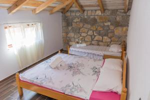 Ένα ή περισσότερα κρεβάτια σε δωμάτιο στο Leonida Resort