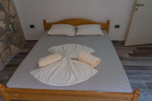 Ένα ή περισσότερα κρεβάτια σε δωμάτιο στο Leonida Resort
