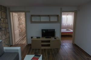 Μια τηλεόραση ή/και κέντρο ψυχαγωγίας στο Leonida Resort