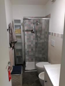 a bathroom with a shower and a toilet at La casa di Gigioz in Sestri Levante