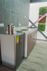 Kuchyň nebo kuchyňský kout v ubytování Apartamento 12 Cali Sur