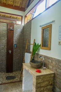Vonios kambarys apgyvendinimo įstaigoje Cozy Cottages Lombok