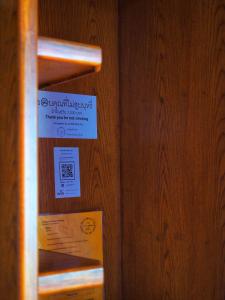 Certifikát, hodnocení, plakát nebo jiný dokument vystavený v ubytování Baansuan Resort