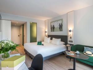 Postel nebo postele na pokoji v ubytování Mercure Ajaccio