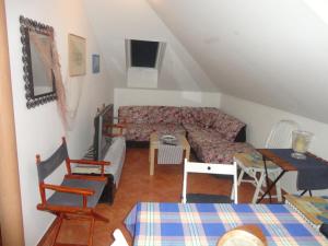 Posezení v ubytování Apartment Gliha