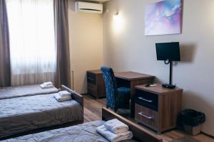 Postel nebo postele na pokoji v ubytování Hotel Euforia Lounge