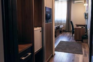 TV a/nebo společenská místnost v ubytování Hotel Euforia Lounge