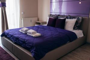 Postel nebo postele na pokoji v ubytování Hotel Euforia Lounge