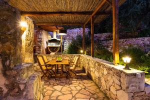 A patio or other outdoor area at Vrisali Traditional Stone Villa
