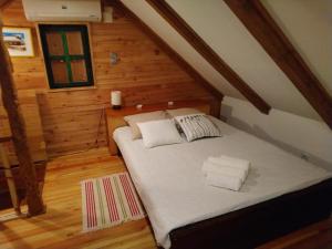 Postel nebo postele na pokoji v ubytování Apartman rico