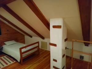 Postel nebo postele na pokoji v ubytování Apartman rico