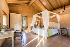 A bed or beds in a room at Vrisali Traditional Stone Villa