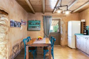 A kitchen or kitchenette at Vrisali Traditional Stone Villa