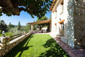 A garden outside Vrisali Traditional Stone Villa