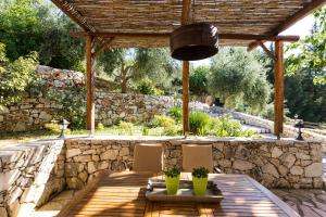 A garden outside Vrisali Traditional Stone Villa