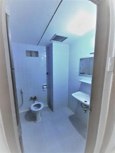 Kylpyhuone majoituspaikassa Singapore Hotel