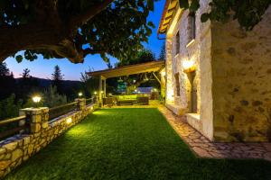 A garden outside Vrisali Traditional Stone Villa