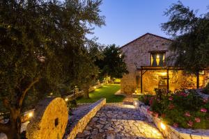 A garden outside Vrisali Traditional Stone Villa