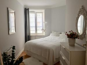 Postel nebo postele na pokoji v ubytování Beautiful apartment in the heart of Warsaw, Poznanska