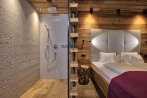 Łóżko lub łóżka w pokoju w obiekcie LISA-Chalets