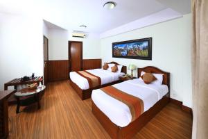 Ένα ή περισσότερα κρεβάτια σε δωμάτιο στο Samsara Boutique Hotel