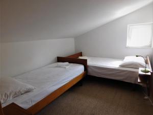 Łóżko lub łóżka w pokoju w obiekcie Charming apartment Karlo