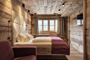 Łóżko lub łóżka w pokoju w obiekcie LISA-Chalets
