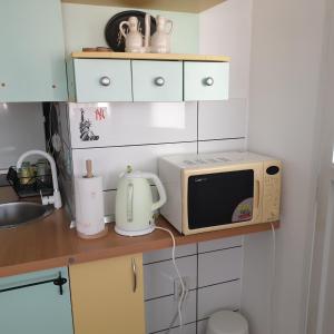 Kuchyňa alebo kuchynka v ubytovaní Apartman Jež - free parking, self check in