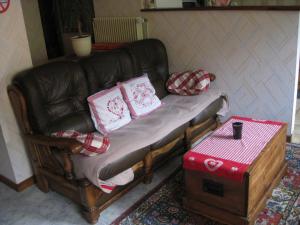 Posezení v ubytování Aux coeurs de la vallée