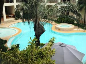Bazén v ubytování Citystate Asturias Hotel Palawan nebo v jeho okolí