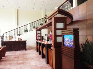 TV a/nebo společenská místnost v ubytování Citystate Asturias Hotel Palawan
