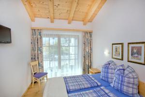 Postel nebo postele na pokoji v ubytování Haus Seifriedsberger