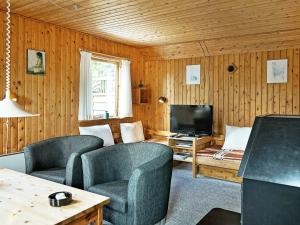 A seating area at Two-Bedroom Holiday home in Aakirkeby 8