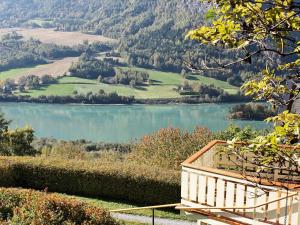 a house with a view of a lake at 6 person holiday home in Otta in Otta