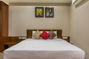 Letto o letti in una camera di Five Elements