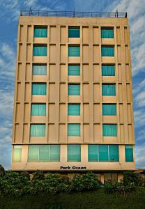 a tall building with windows on the side of it at Park Ocean in Jaipur