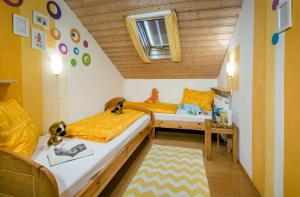 מיטה או מיטות בחדר ב-Hochgallinger Hof