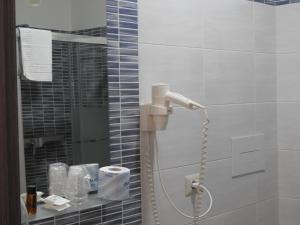 Koupelna v ubytování ChrisMare Hotel