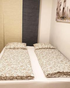 Postel nebo postele na pokoji v ubytování Apartman Bilja 3*