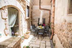 Balkón alebo terasa v ubytovaní Ortigia Ancient House