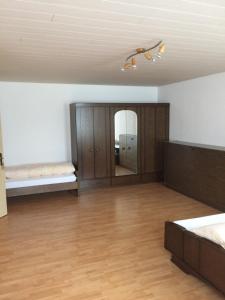 Postel nebo postele na pokoji v ubytování Hotel Alpina