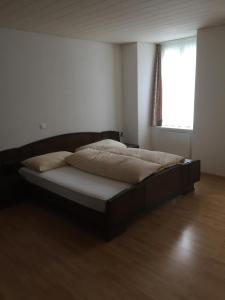 Postel nebo postele na pokoji v ubytování Hotel Alpina