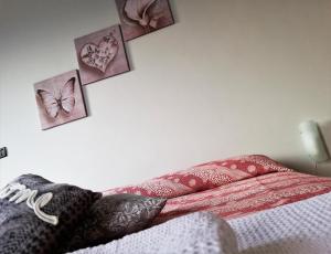 Postel nebo postele na pokoji v ubytování Nido d'amore