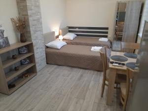 Postel nebo postele na pokoji v ubytování Apartment RELAX
