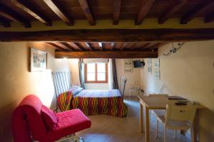 Postel nebo postele na pokoji v ubytování Agriturismo Il Poderaccio