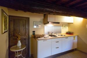 Kuchyň nebo kuchyňský kout v ubytování Agriturismo Il Poderaccio