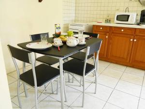 Kuchyň nebo kuchyňský kout v ubytování Villa Zannanas