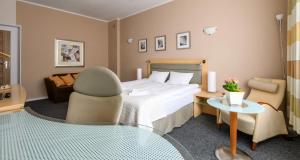 Posteľ alebo postele v izbe v ubytovaní 404 Rooms Wilanowska