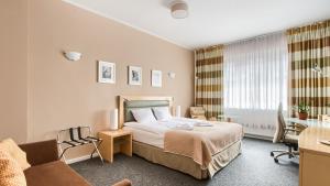 Posteľ alebo postele v izbe v ubytovaní 404 Rooms Wilanowska